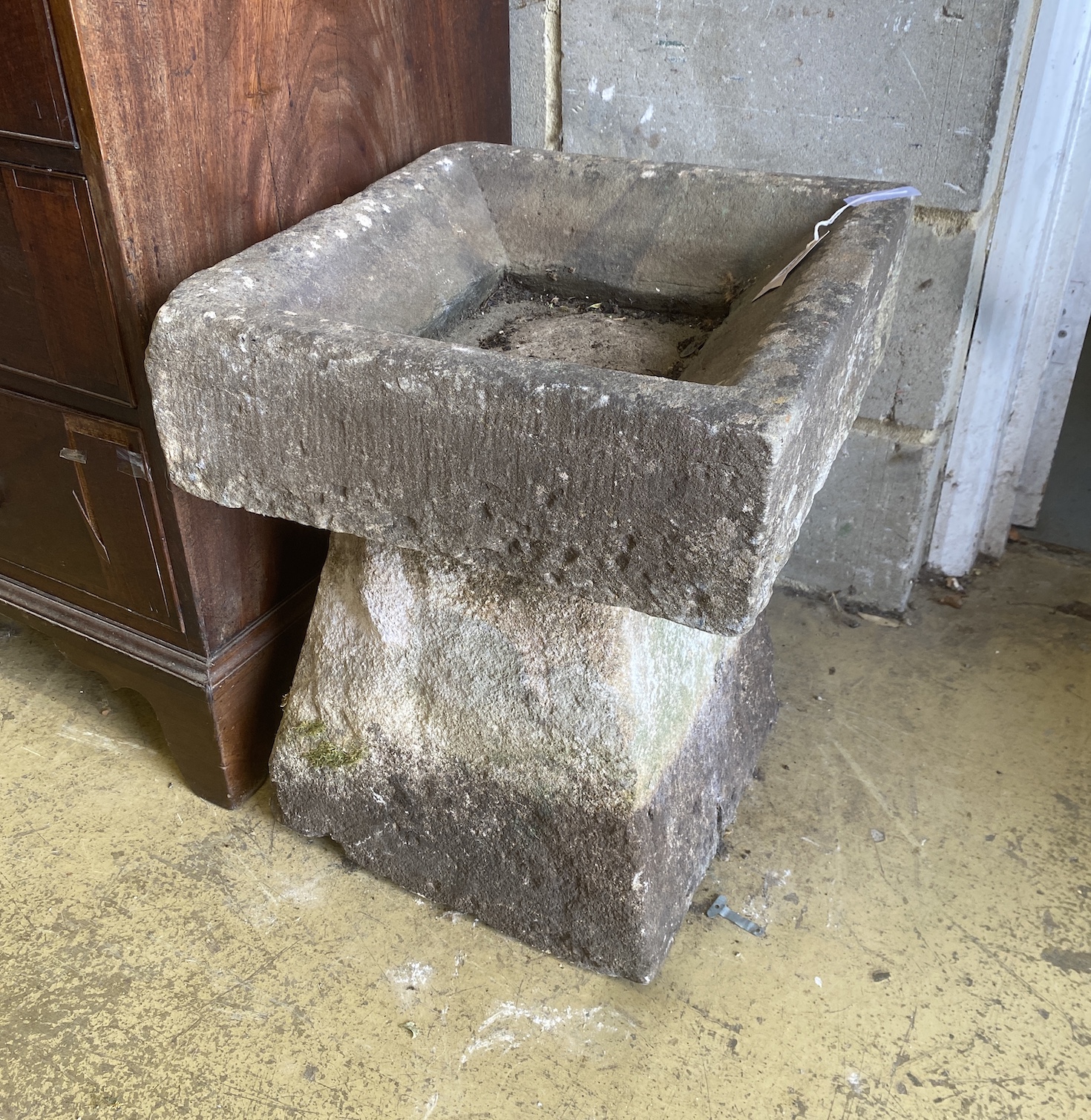 A 19th century staddle stone base with reconstituted bird bath top, width 44cm, depth 45cm, height 52cm